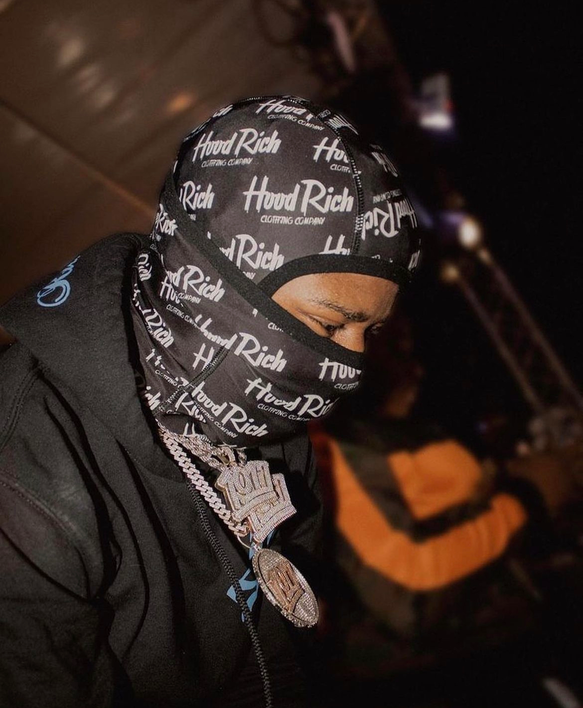 Rapper Big Scarr In Our Black Pooh Shiesty Mask. He stamped HoodRich Clothing as the next brand to blow.